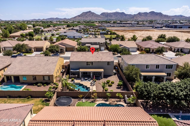 aerial view with a mountain view and a residential view