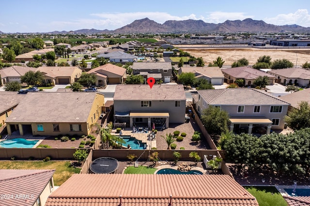 bird's eye view with a mountain view and a residential view