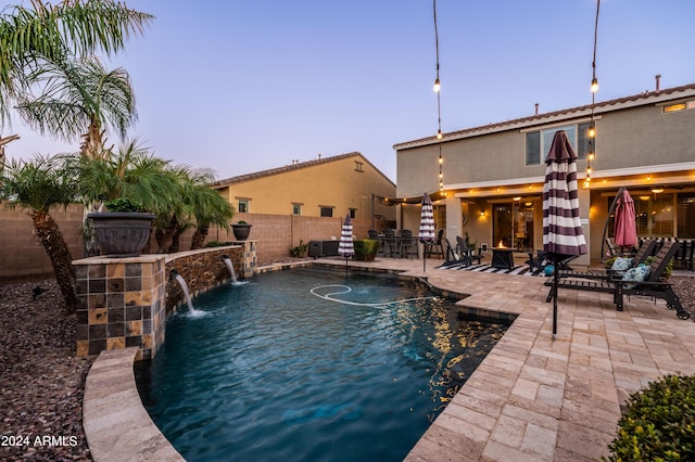 view of swimming pool featuring a fenced in pool, a patio, a fenced backyard, and central air condition unit