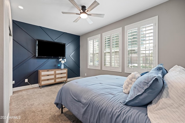 bedroom featuring baseboards and carpet floors