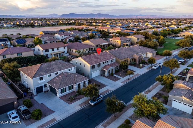 aerial view with a mountain view and a residential view