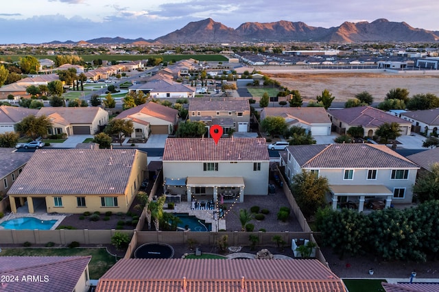 drone / aerial view with a mountain view and a residential view