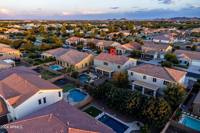 aerial view at dusk with a residential view