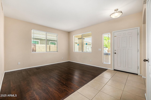 8214 S 48th Dr, Laveen, AZ 85339 - entrance foyer featuring light wood-type flooring and baseboards