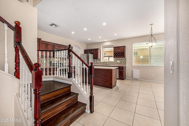 8214 S 48th Dr, Laveen, AZ 85339 - stairs featuring tile patterned floors, recessed lighting, and baseboards