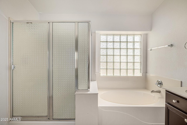 8214 S 48th Dr, Laveen, AZ 85339 - bathroom featuring vanity, a garden tub, and a shower stall