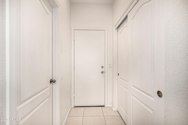 8214 S 48th Dr, Laveen, AZ 85339 - hallway with light tile patterned floors