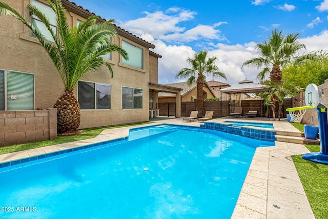 8214 S 48th Dr, Laveen, AZ 85339 - view of pool with a gazebo, a patio area, a fenced backyard, and a pool with connected hot tub