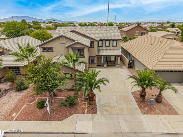 8214 S 48th Dr, Laveen, AZ 85339 - view of property with driveway, stucco siding, and a residential view