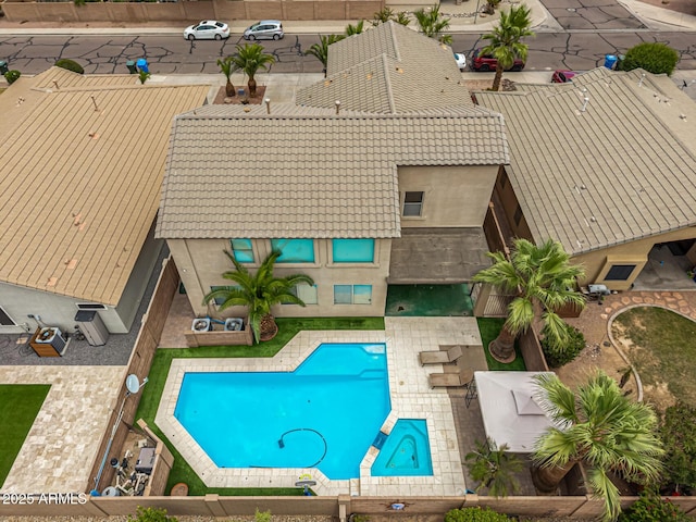 8214 S 48th Dr, Laveen, AZ 85339 - view of swimming pool with a patio and a pool with connected hot tub