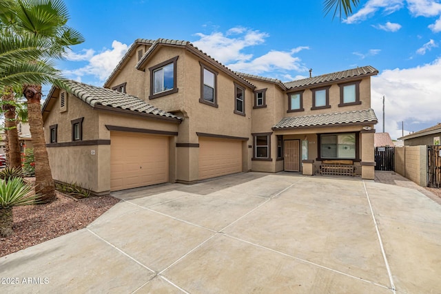 8214 S 48th Dr, Laveen, AZ 85339 - view of front of home with a tiled roof, stucco siding, and an attached garage