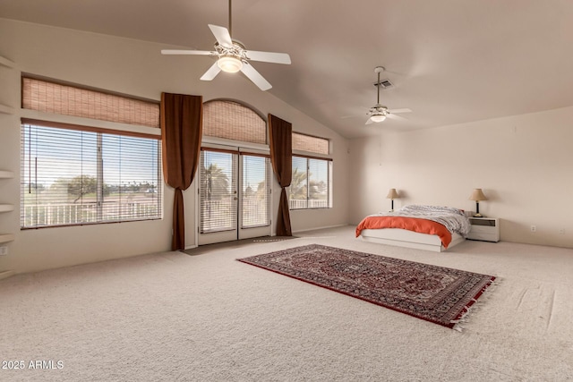 carpeted bedroom featuring vaulted ceiling, multiple windows, visible vents, and access to exterior