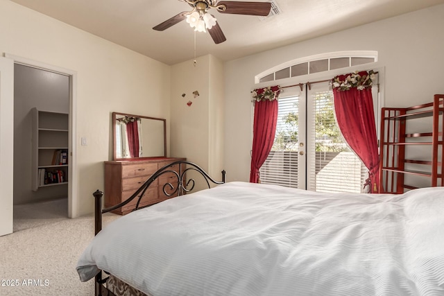bedroom featuring french doors, a ceiling fan, and access to exterior