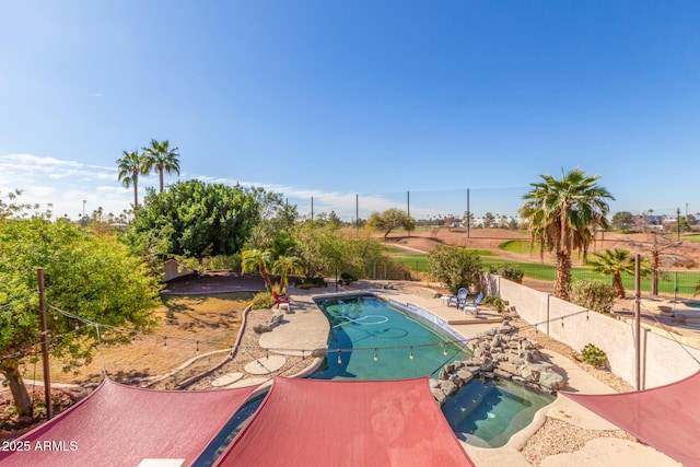 view of swimming pool featuring an in ground hot tub, a fenced backyard, a fenced in pool, and a patio