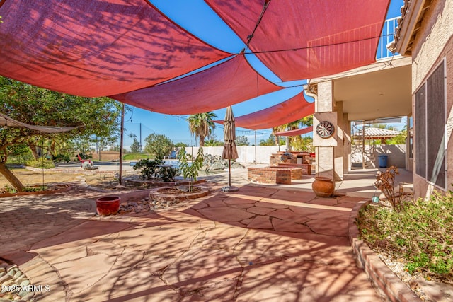 view of patio with fence