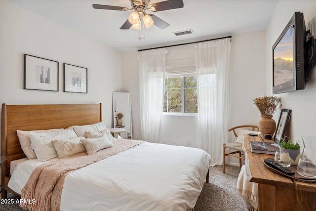 bedroom with carpet floors and a ceiling fan