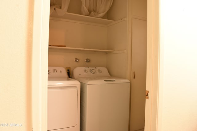 laundry room with washer and dryer