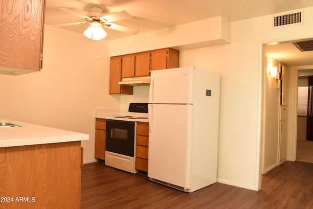 kitchen featuring white appliances, ceiling fan, and dark hardwood / wood-style flooring