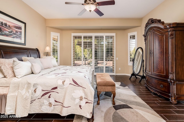 bedroom with ceiling fan and access to exterior