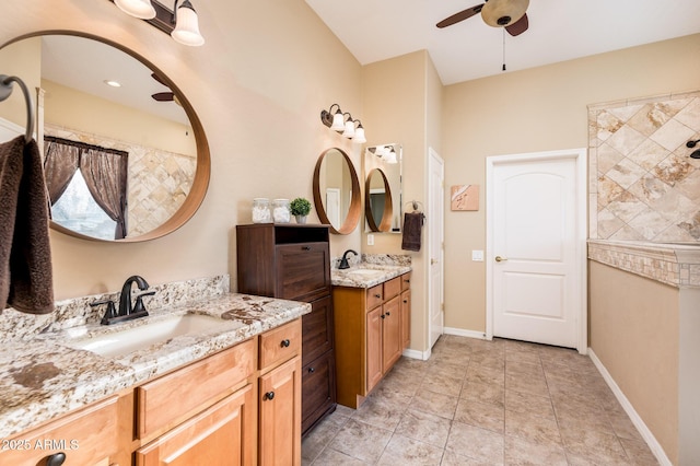 bathroom with vanity and ceiling fan