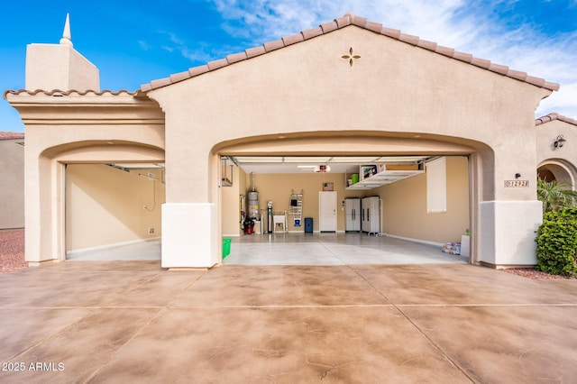 rear view of house with water heater