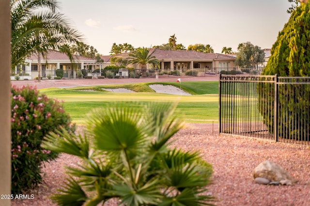 surrounding community featuring a lawn