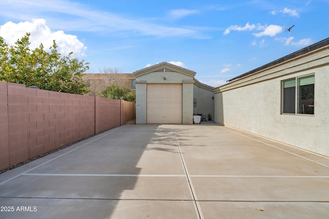 garage featuring fence