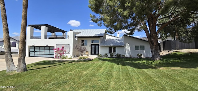 view of front of property with a garage, stucco siding, and concrete driveway