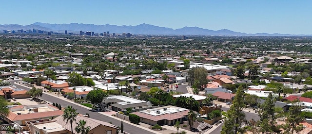 aerial perspective of suburban area with mountains