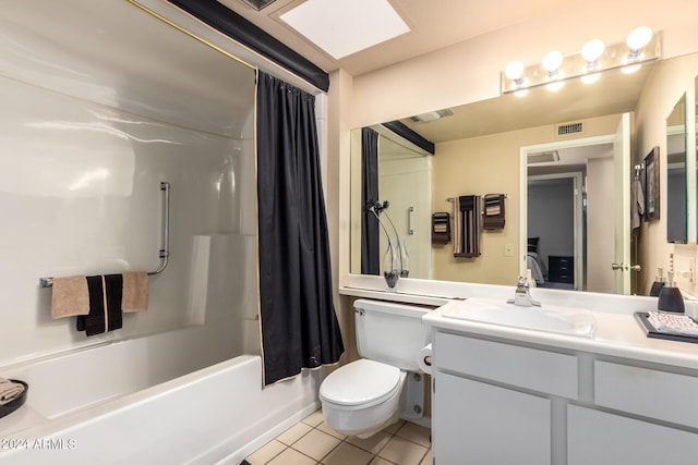 bathroom with vanity, tile patterned flooring, toilet, visible vents, and shower / bath combo with shower curtain