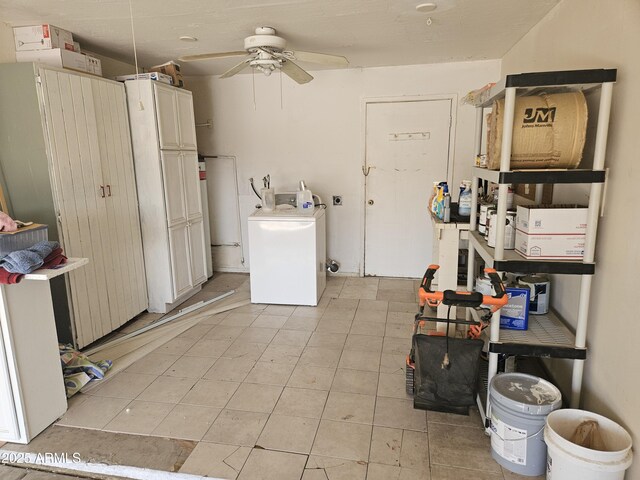 clothes washing area with washer / clothes dryer, light tile patterned floors, and a ceiling fan