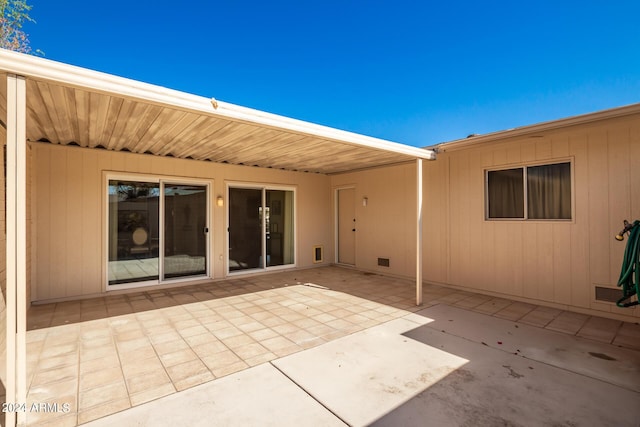 rear view of property with a patio