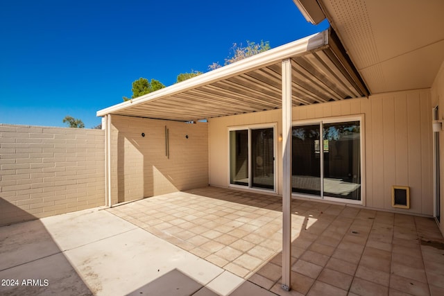 view of patio with fence