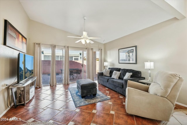 living room with ceiling fan and lofted ceiling