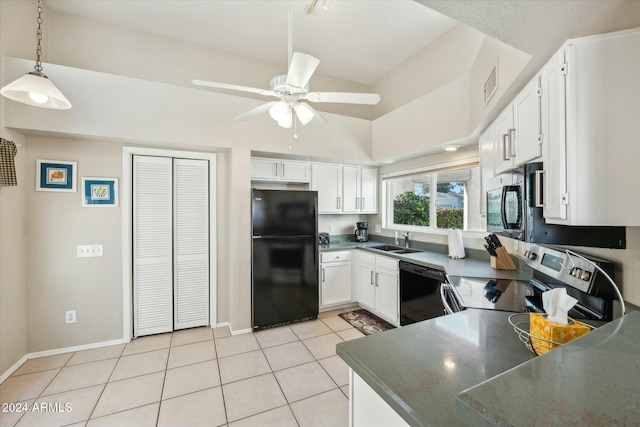 kitchen featuring white cabinets, light tile patterned floors, sink, and black appliances