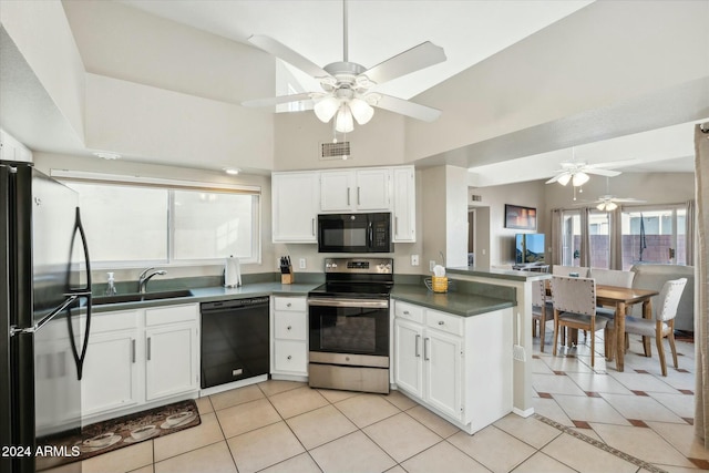 kitchen featuring black appliances, white cabinets, sink, light tile patterned floors, and kitchen peninsula