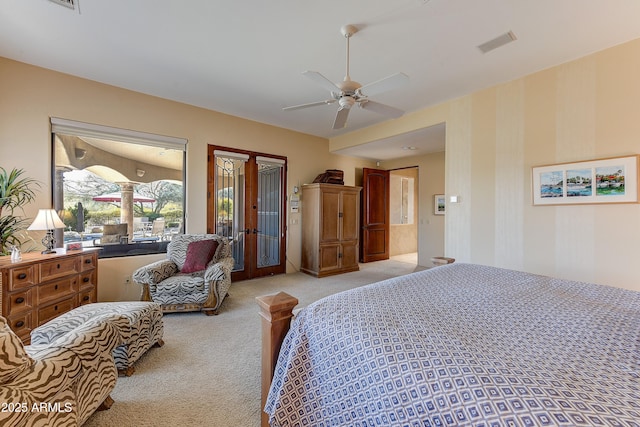 bedroom with light carpet, ceiling fan, and visible vents