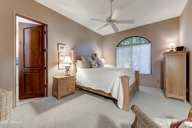 bedroom with light carpet and a ceiling fan