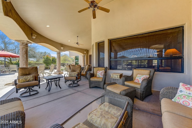 view of patio featuring outdoor lounge area and a ceiling fan