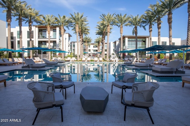 view of pool with a patio area