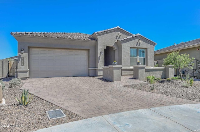 view of front of property featuring a garage