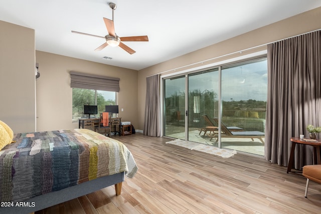 bedroom with access to outside, light hardwood / wood-style flooring, and ceiling fan