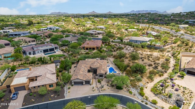 drone / aerial view featuring a mountain view