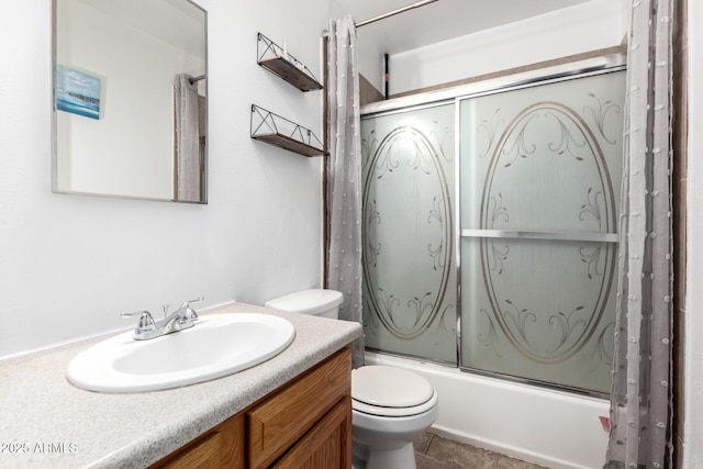 7506 N 47th Dr, Glendale, AZ 85301 - bathroom featuring shower / bath combination with glass door, vanity, and toilet
