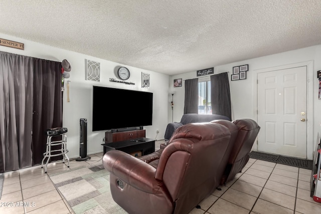 7506 N 47th Dr, Glendale, AZ 85301 - living area featuring light tile patterned floors and a textured ceiling