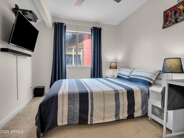 bedroom featuring carpet floors, a ceiling fan, baseboards, and lofted ceiling with beams