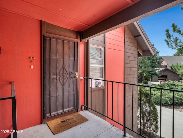 doorway to property featuring a balcony