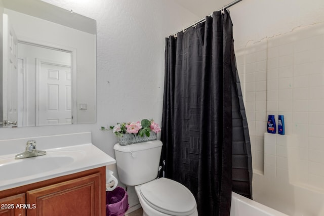 bathroom featuring vanity, toilet, and shower / bathtub combination with curtain