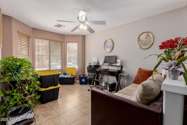 office area featuring ceiling fan and light tile patterned floors