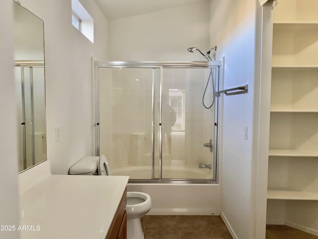 2402 E 5th St Unit 1472, Tempe, AZ 85288 - bathroom featuring vanity, bath / shower combo with glass door, a spacious closet, and tile patterned flooring